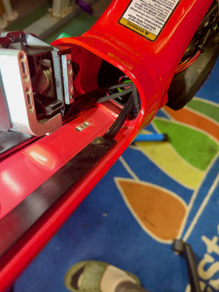 Lower battery mount removed from the frame.